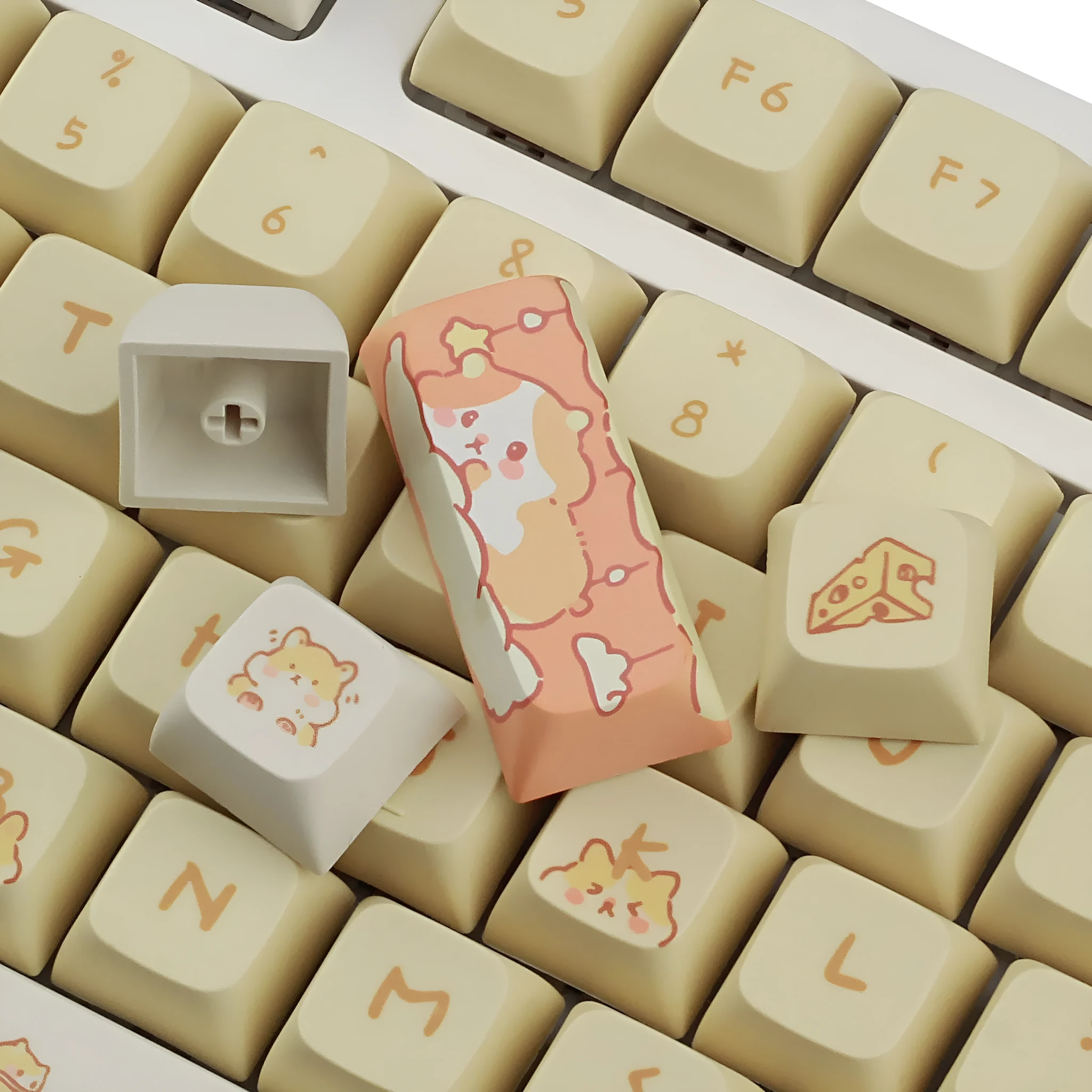 Custard yellow and soft grey XDA profile plastic keycap sets for mechanical keyboards.