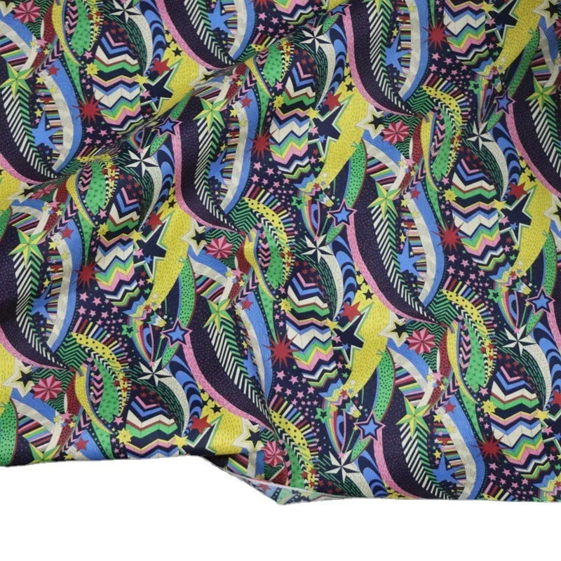Blue digital print cotton fabric with plant and flower pattern showing 145cm width measurement