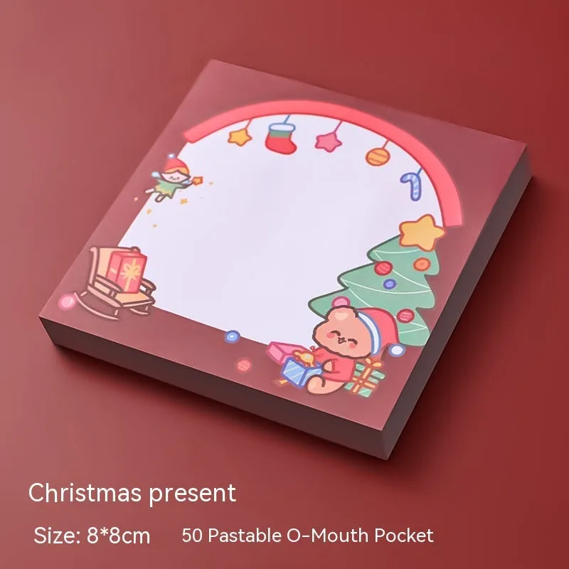 Christmas sticky notes book with festive designs of bear, elf, gift, house, sled, snowman, crystal ball, and Santa Claus.