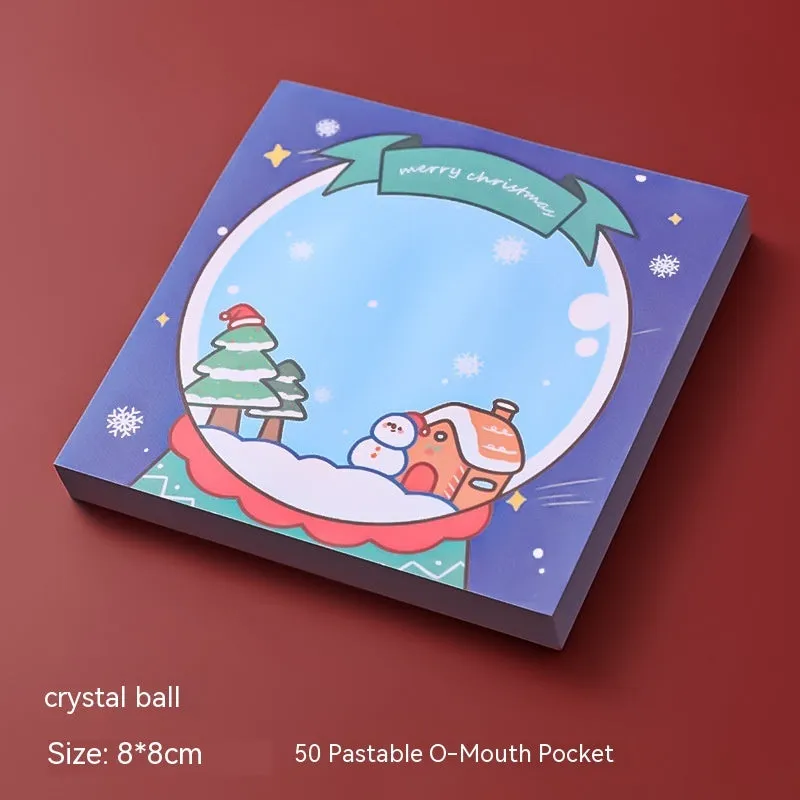Christmas sticky notes book with festive designs of bear, elf, gift, house, sled, snowman, crystal ball, and Santa Claus.