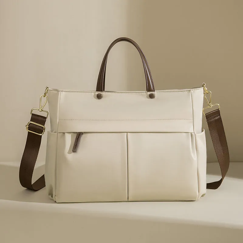 Women's Oxford cloth briefcase bag in elegant black with contrast colour detailing and stitching
