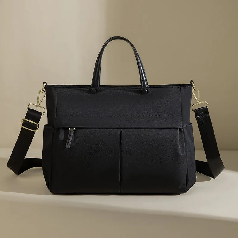 Women's Oxford cloth briefcase bag in elegant black with contrast colour detailing and stitching