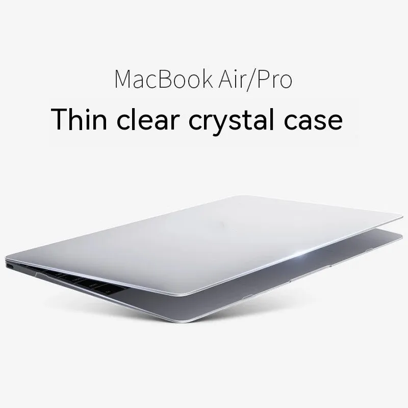 MacBook Pro laptop with a crystal transparent protective hard shell case snapped onto its lid and base.