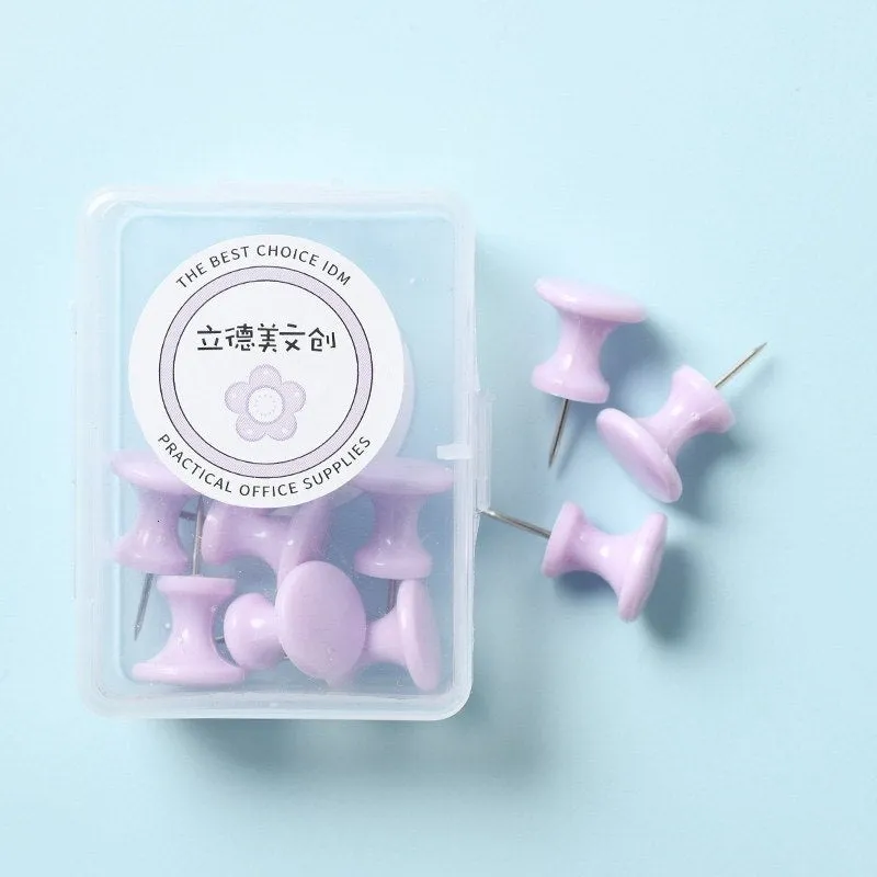 Boxed plastic push pins in macaron colours: cherry blossom pink, mint green, and lavender in large and small sizes