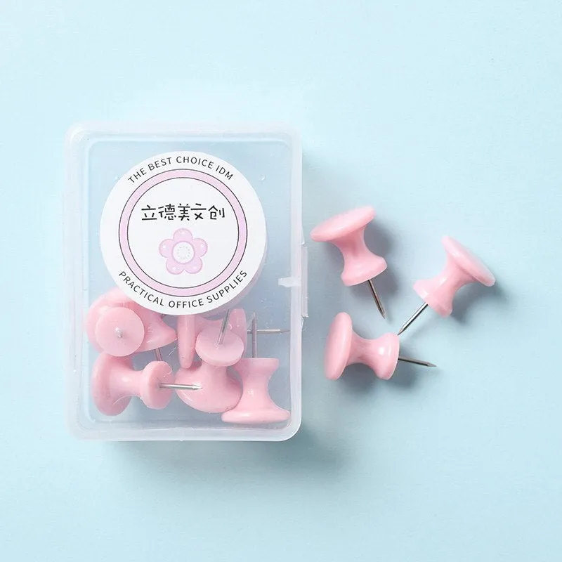 Boxed plastic push pins in macaron colours: cherry blossom pink, mint green, and lavender in large and small sizes
