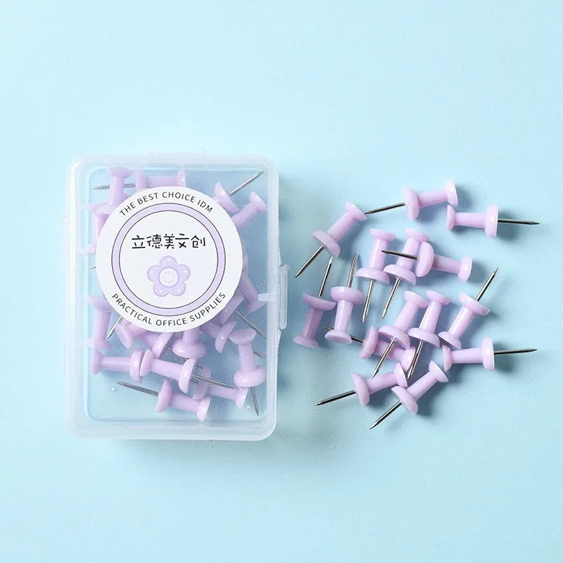 Boxed plastic push pins in macaron colours: cherry blossom pink, mint green, and lavender in large and small sizes