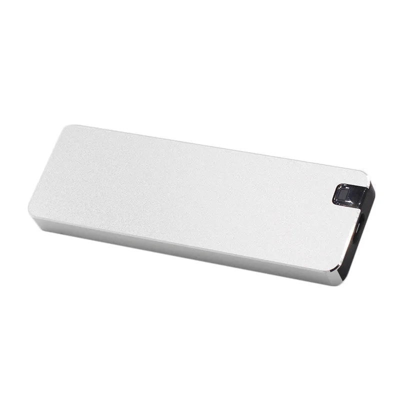 Silver portable metal-shell solid state hard drive with USB cable on a grey background.