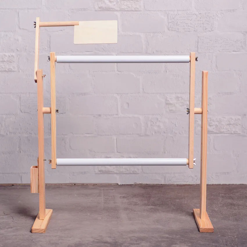 Vertical desktop pine wood cross stitch frame with height adjustment mechanism in natural wood finish