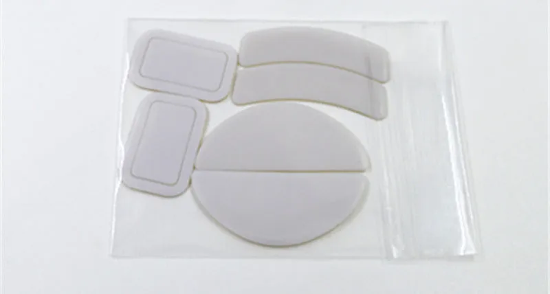 White Razer Juggern arc edge mouse skate replacements for Logitech GPX Superlight and GPW 2 mice with anti-static tweezers.