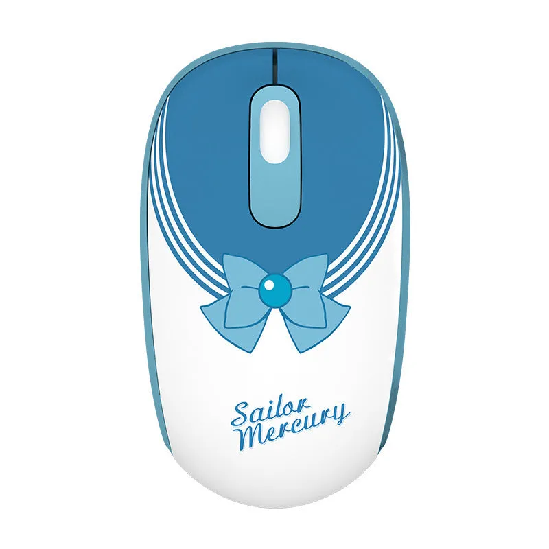 Pink Sailor Moon wireless mouse with USB receiver on a desk.