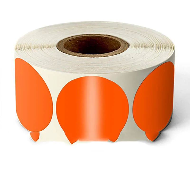 Roll of round colour marker stickers showing multiple colours including black, blue, red, yellow, and kraft paper.
