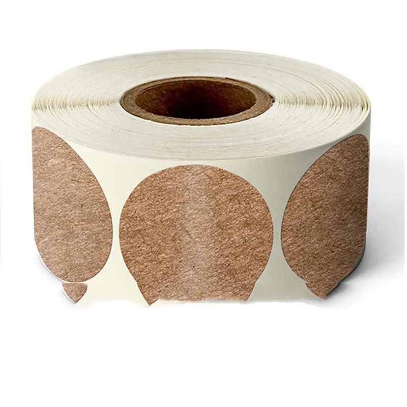 Roll of round colour marker stickers showing multiple colours including black, blue, red, yellow, and kraft paper.