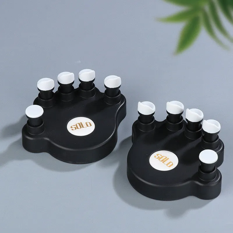 Piano hand corrector gesture straightener for beginners in black, green, or pink colour options.