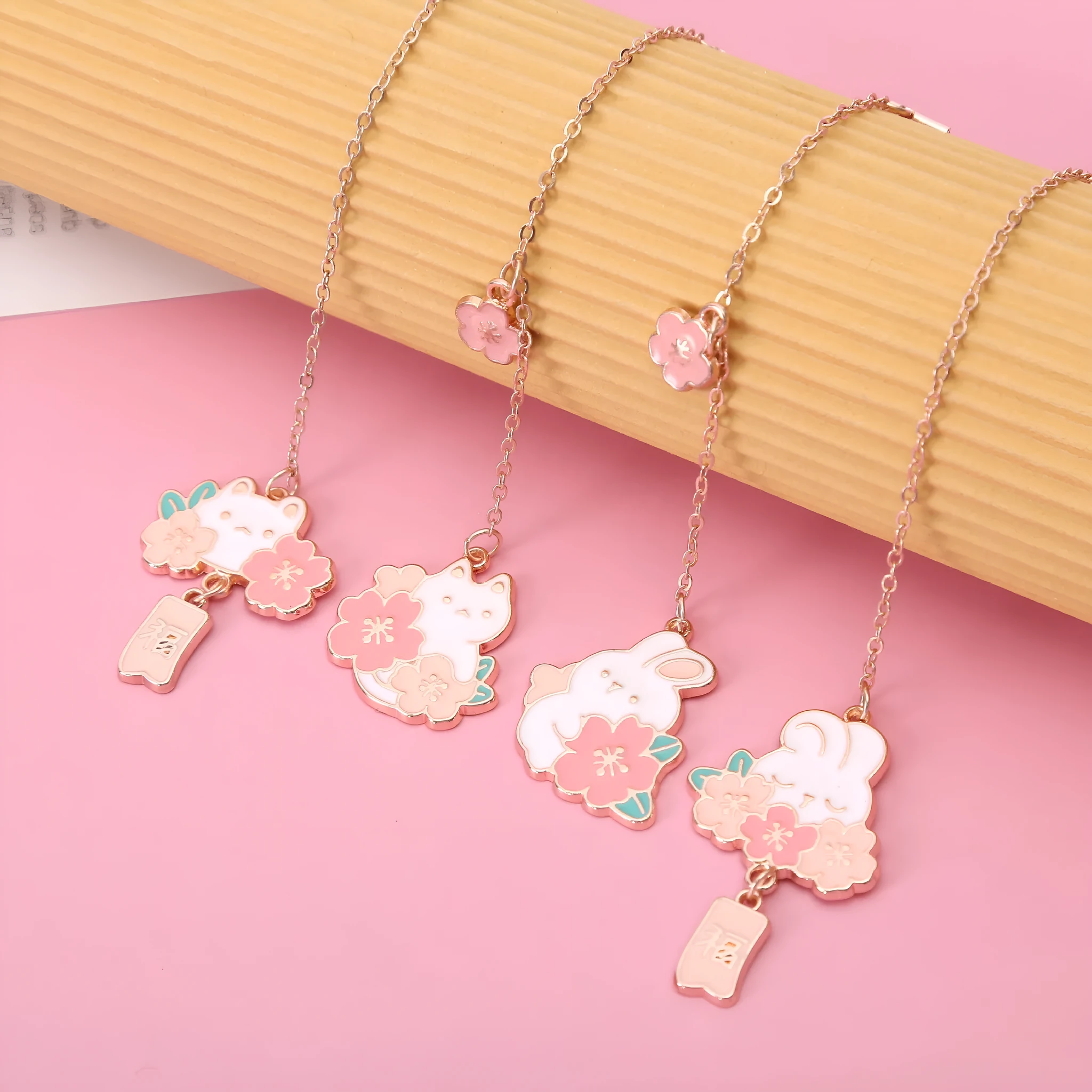Metal pendant bookmark with cherry blossom cartoon cat design for books and journals