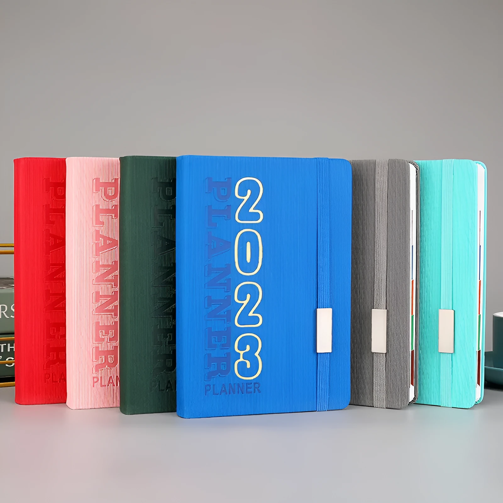 Student almanac notebook with imitation leather cover showing schedule calendar layout and Daolin paper pages