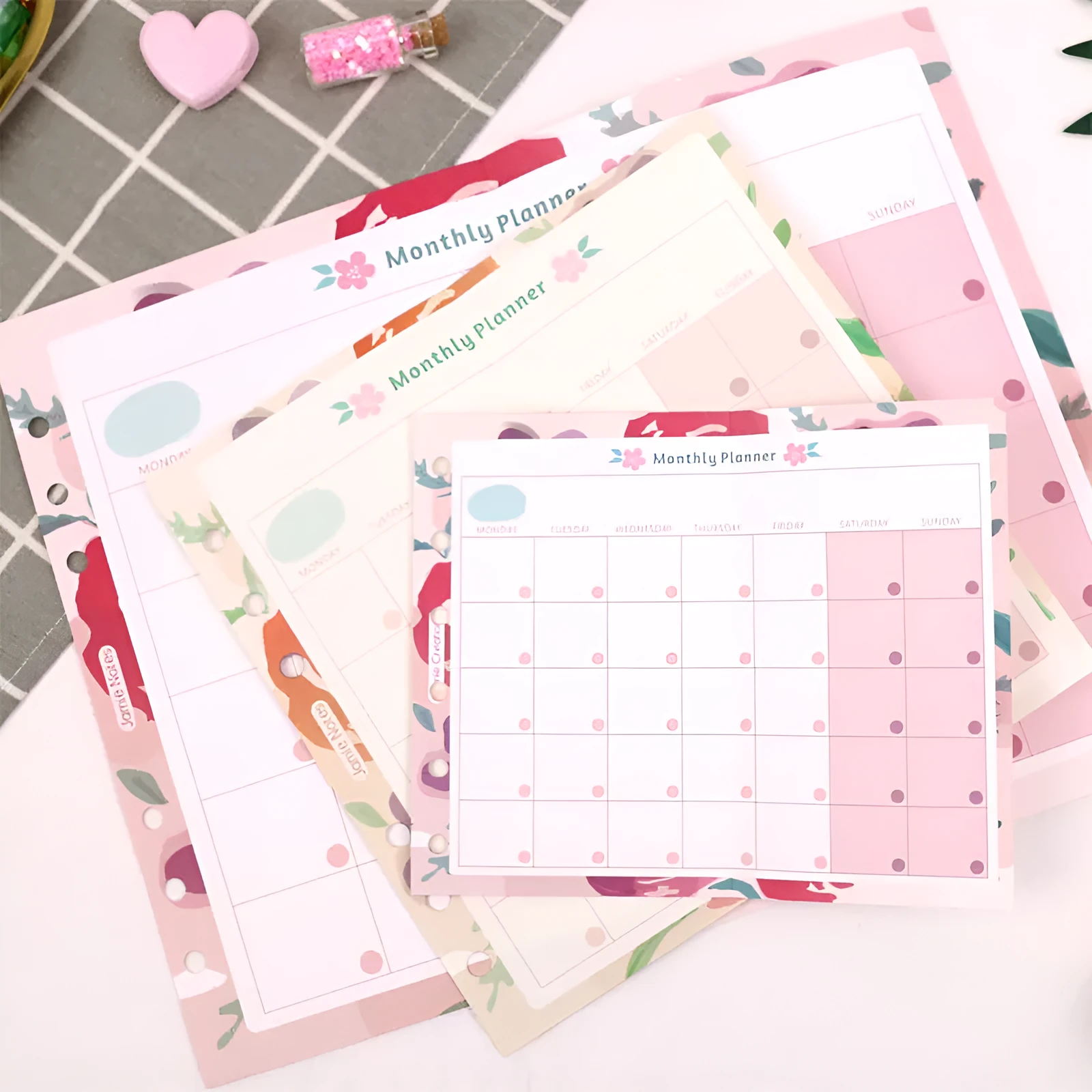 Handbook loose-leaf refill sheets showing floral monthly planner and symphony tri-fold layouts in A5, A6, A7 sizes
