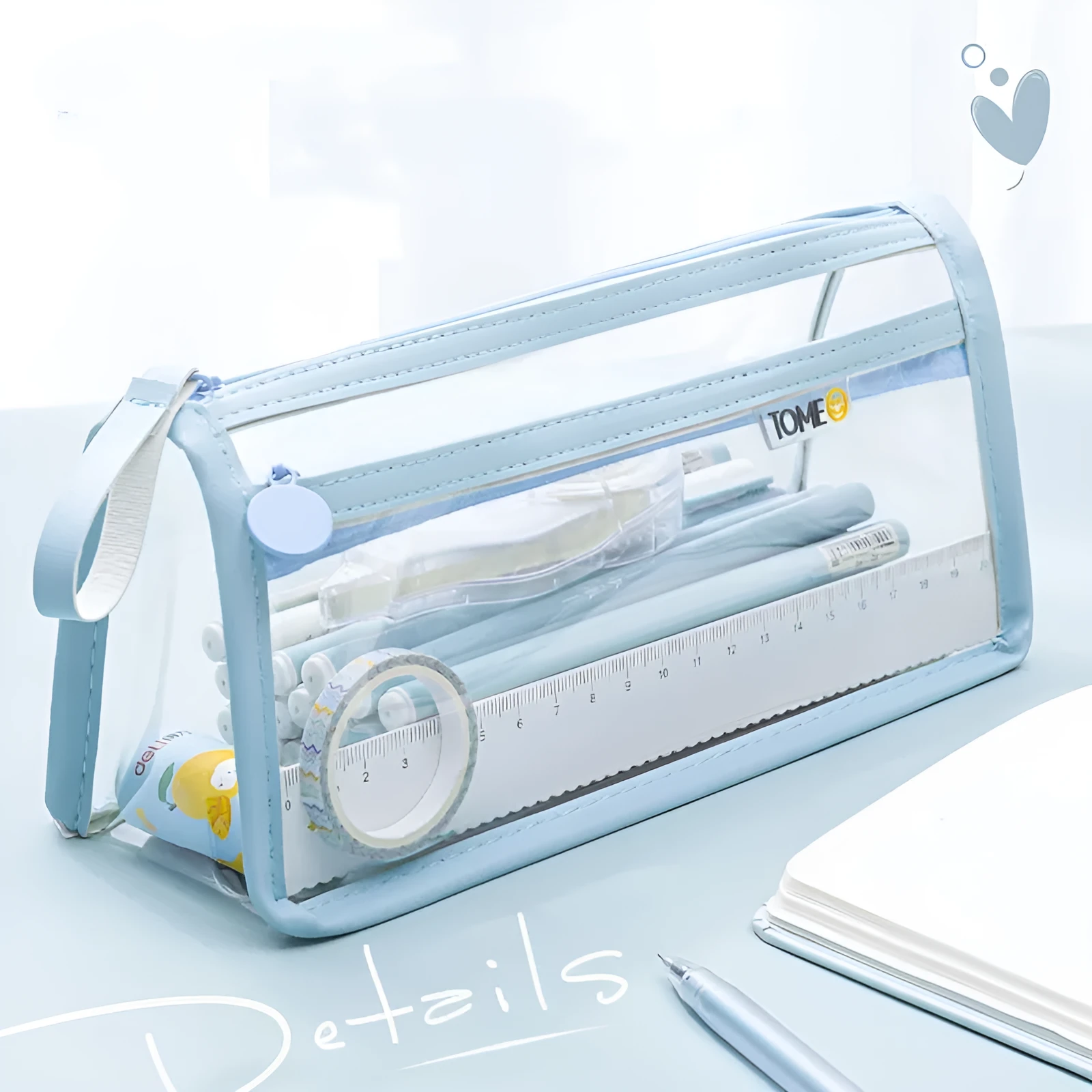 Transparent double-layer pencil case showing internal compartments and stationery organisation