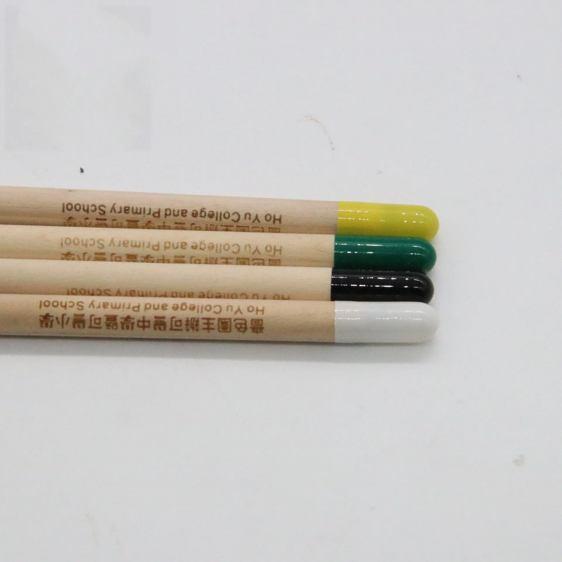 Seed Pencil with coloured degradable capsule tip containing a plant seed, alongside HB refill.