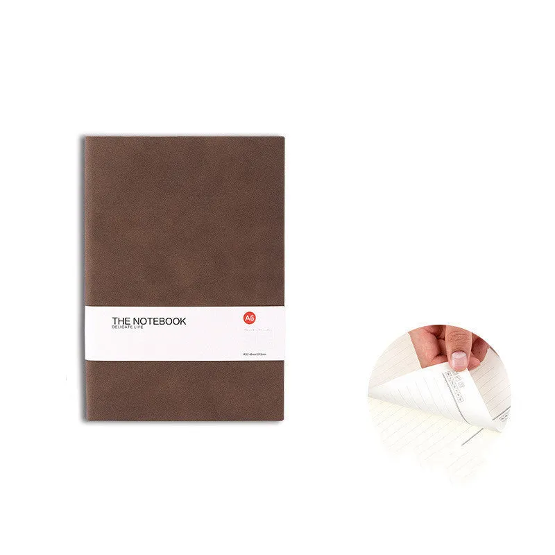 Simple solid-colour thickened notebook in green, dark blue, or orange red, shown in A5, A6, and B5 sizes.