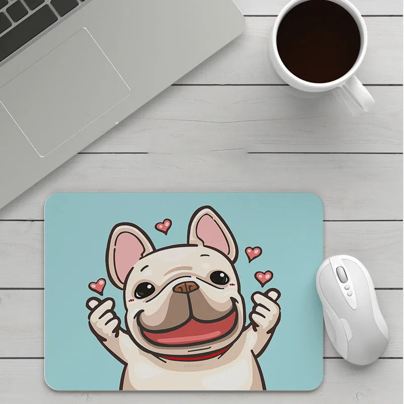 Thick custom cartoon mouse pad with colourful design on a desk, showing black seam edge