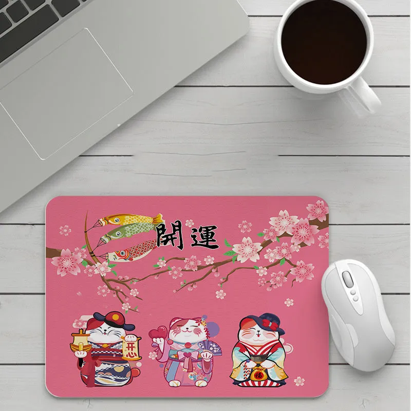 Thick custom cartoon mouse pad with colourful design on a desk, showing black seam edge