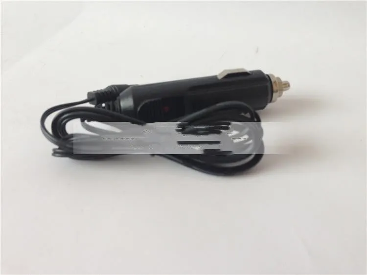GKL112 model 220v car charger unit with US plug, shown with scale indicating 50g weight.