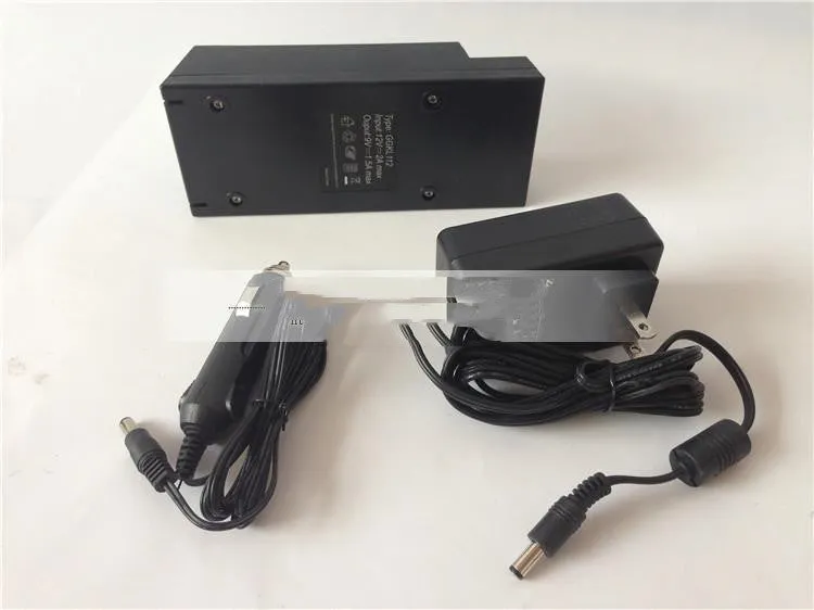 GKL112 model 220v car charger unit with US plug, shown with scale indicating 50g weight.