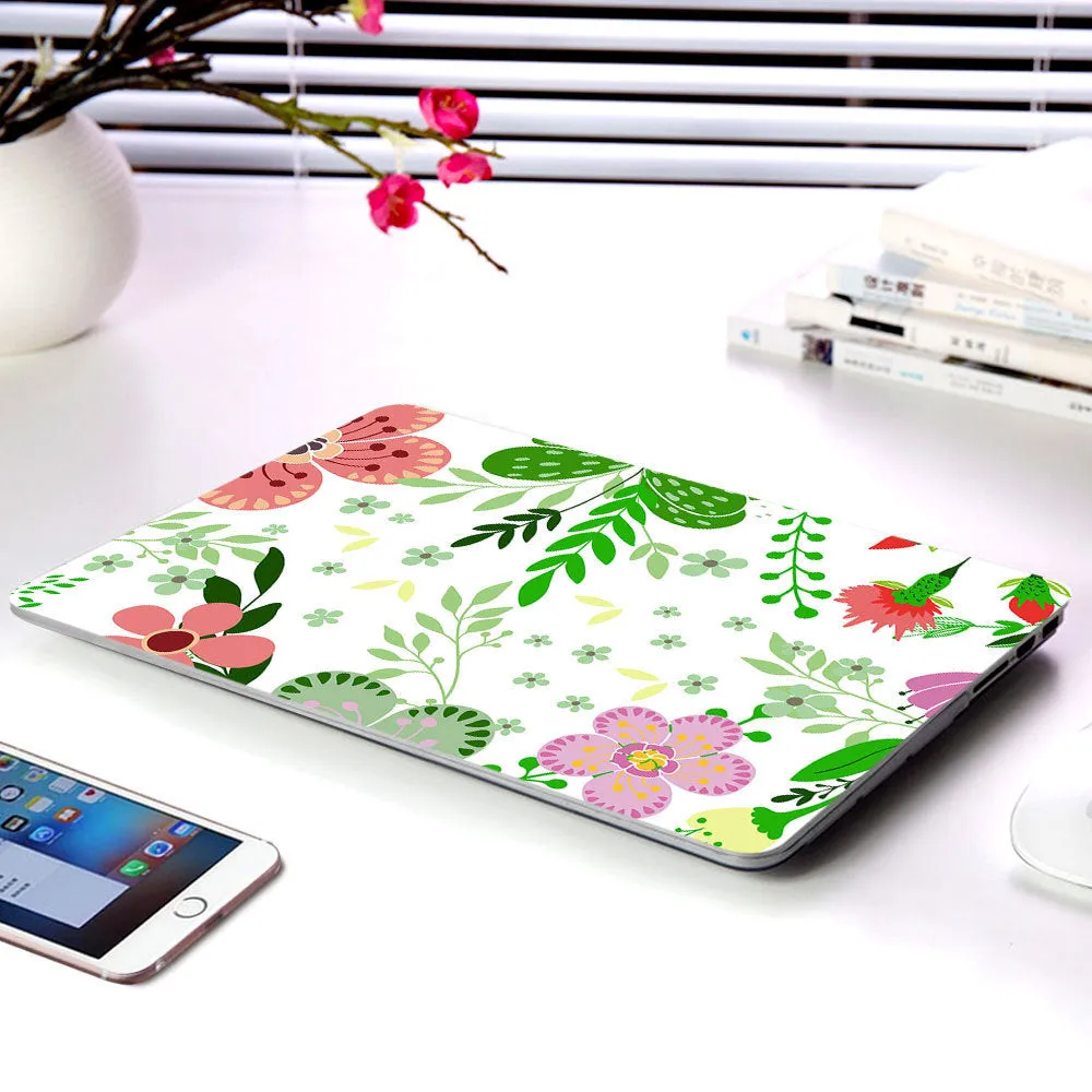 MacBook protective shell with floral pattern design covering laptop top and bottom surfaces