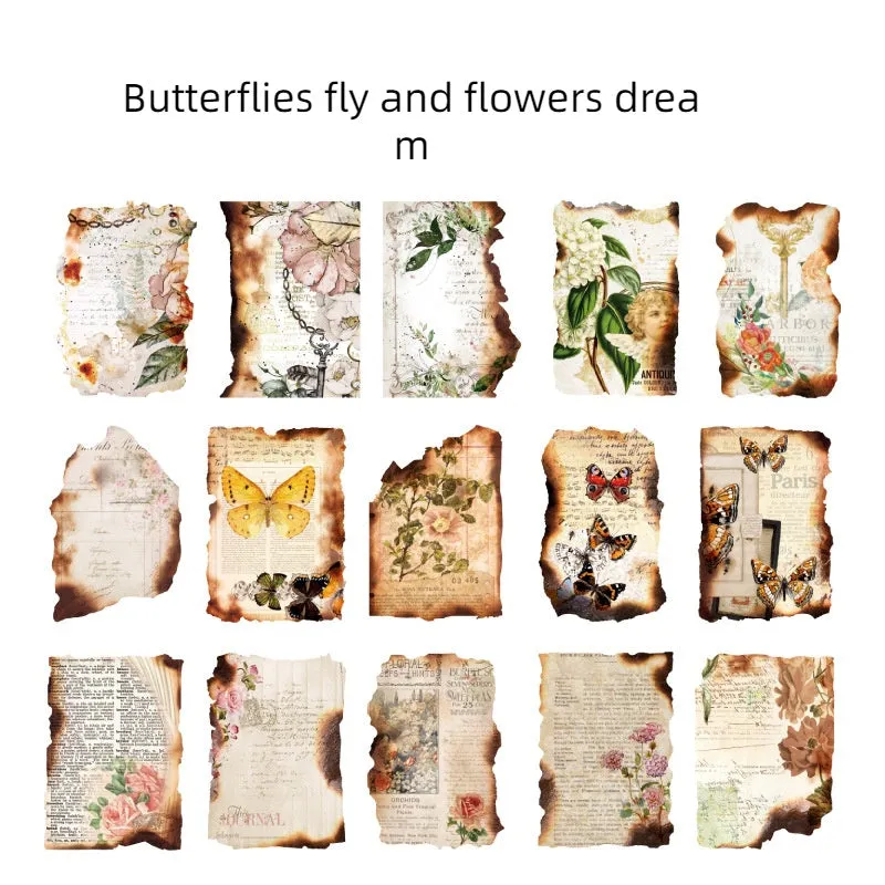 Assortment of Sugar Poem burnt paper fragments with irregular shapes and charred edges on a craft table.