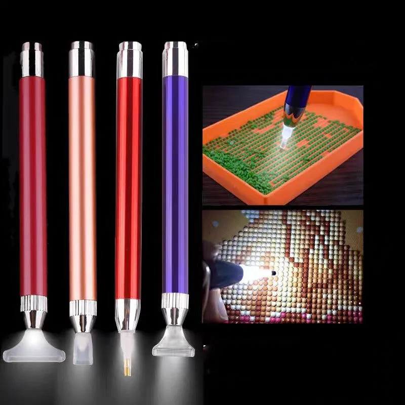 Blue luminous aluminium alloy drill pen for diamond painting and cross stitch crafts on a dark surface.