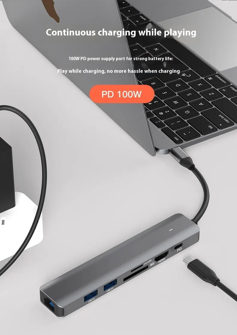 Silver 7-in-1 USB-C laptop hub showing HDMI, USB-C PD, USB 3.0, and SD card ports