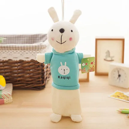 Soft plush rabbit-shaped pencil case in assorted colours, shown with pens inside.