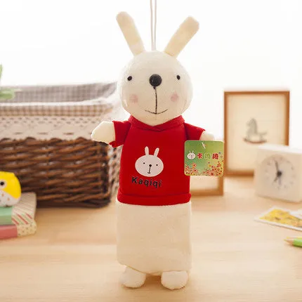 Soft plush rabbit-shaped pencil case in assorted colours, shown with pens inside.