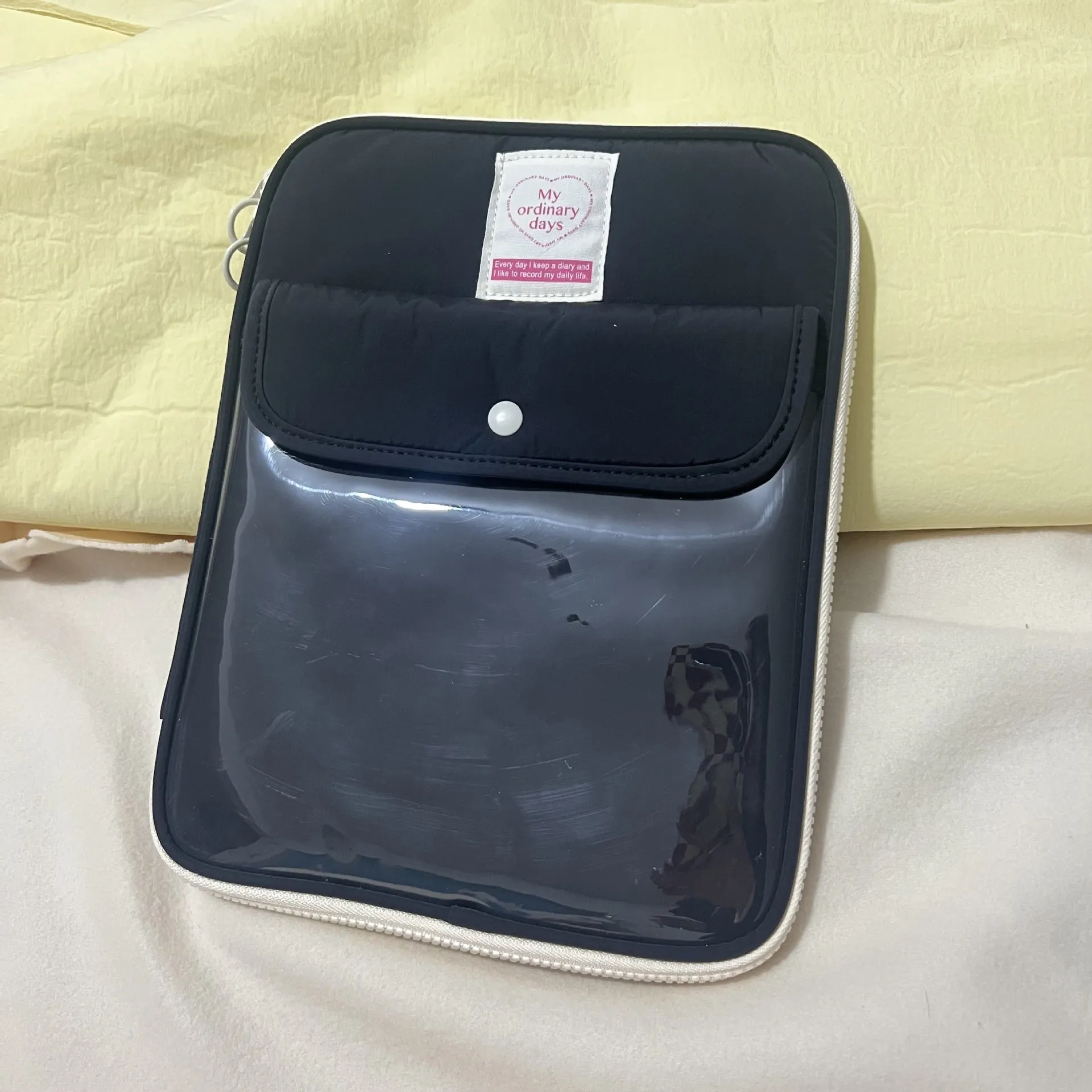 Nylon tablet PC bag with snap pocket closure and elastic strap in five colour options