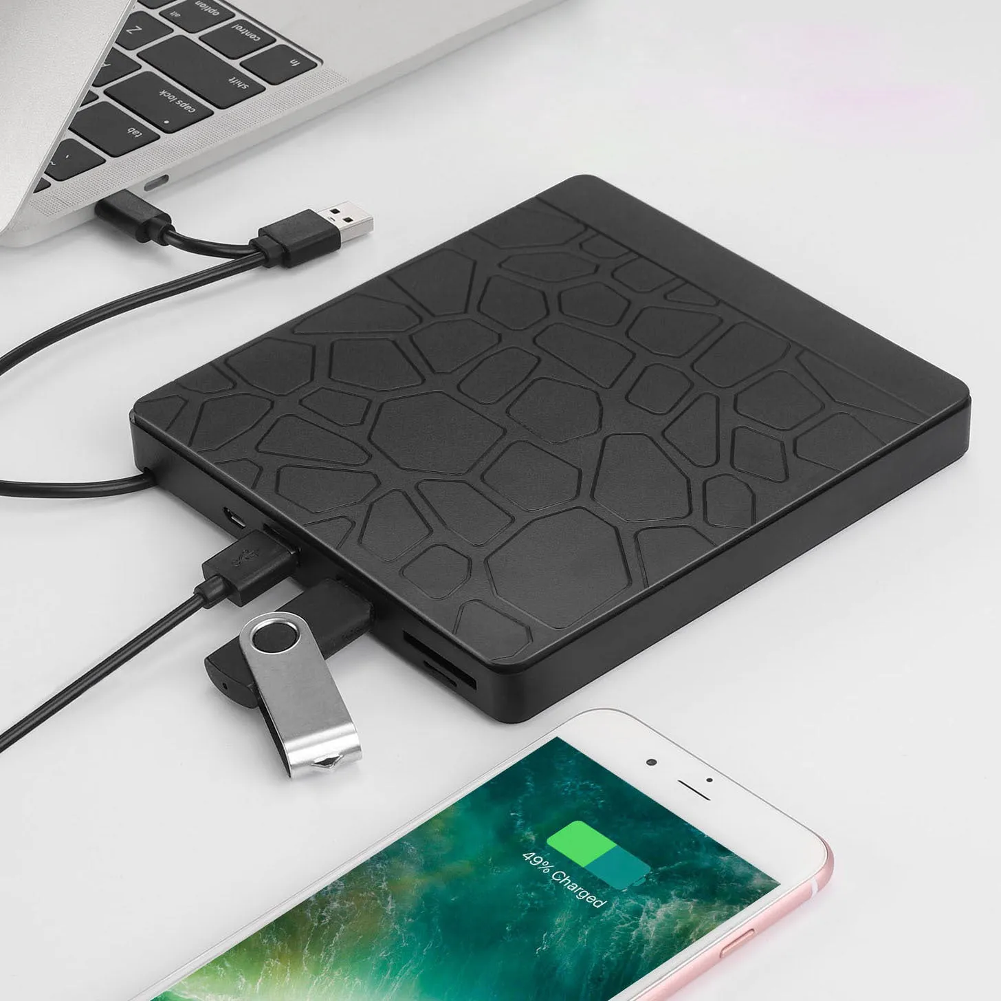 Black portable external optical drive with dual interface connections for laptop computers