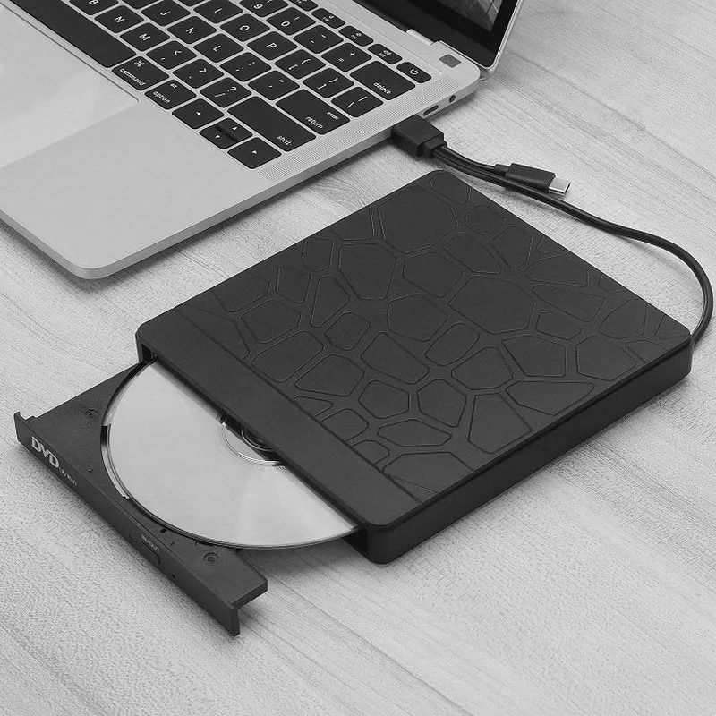 Black portable external optical drive with dual interface connections for laptop computers