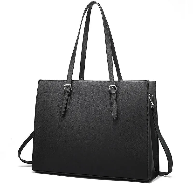 Large black women's business shoulder bag showing computer compartment and three adjustable straps