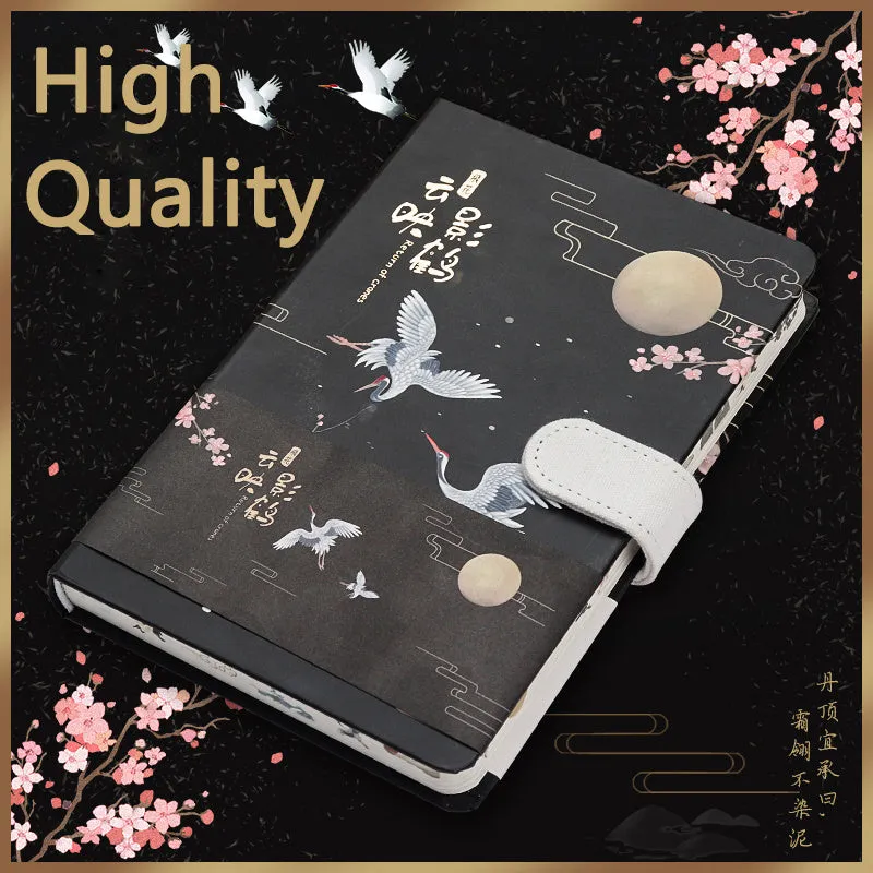 Open A5 wire-bound retro handbook showing full-colour illustrations, with a pen placed alongside.