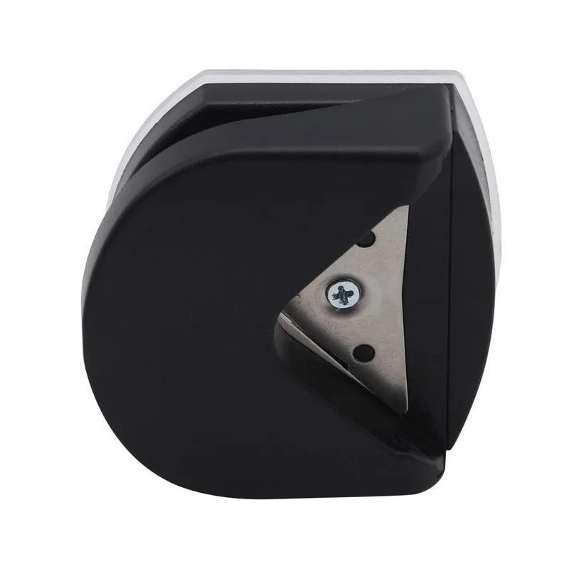 Black plastic and metal business card corner cutter on a white background.