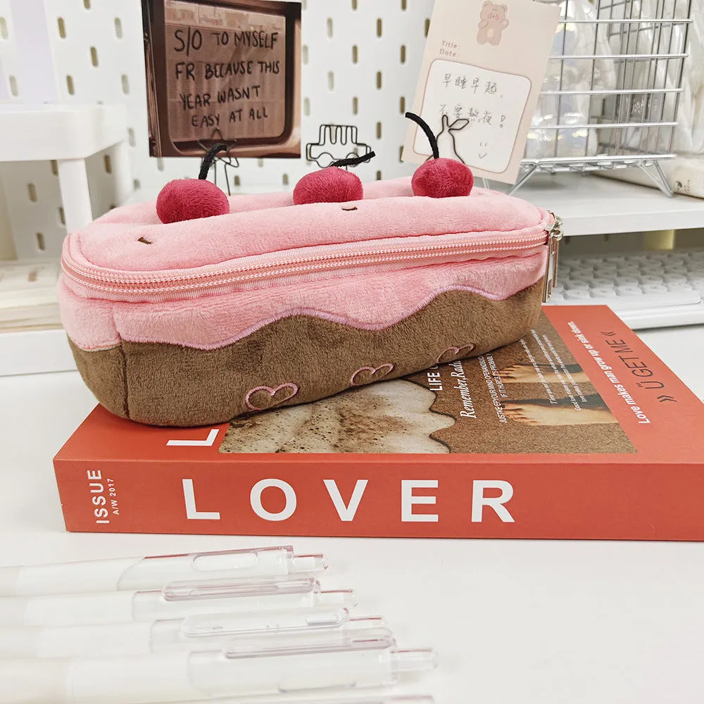 Cherry Cake coloured velvet plush pencil bag in Korean style on a surface.