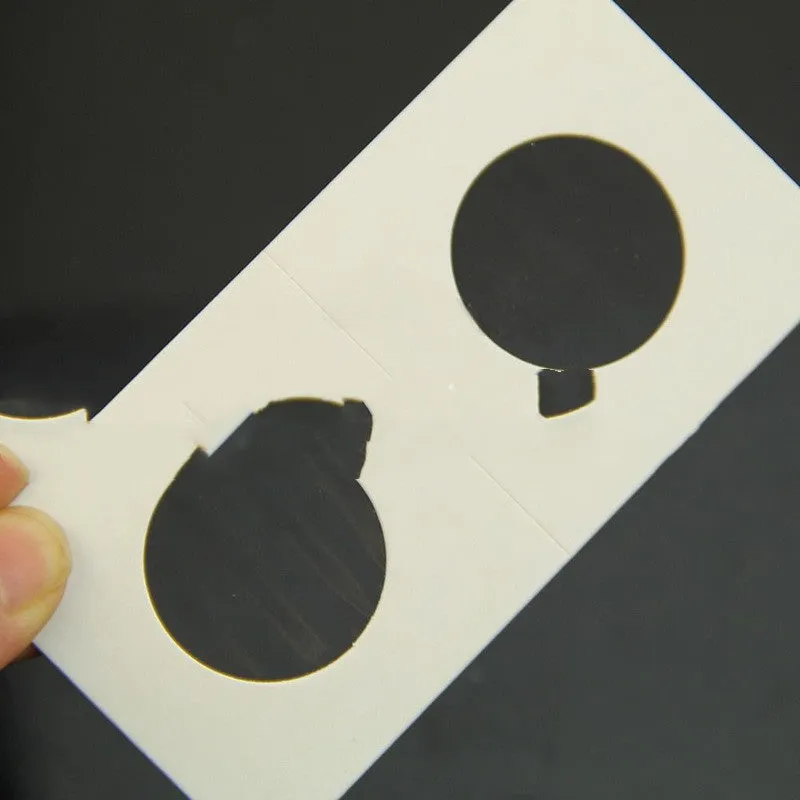 Set of 50 white paper coin protector clips for commemorative coins in a transparent OPP bag.