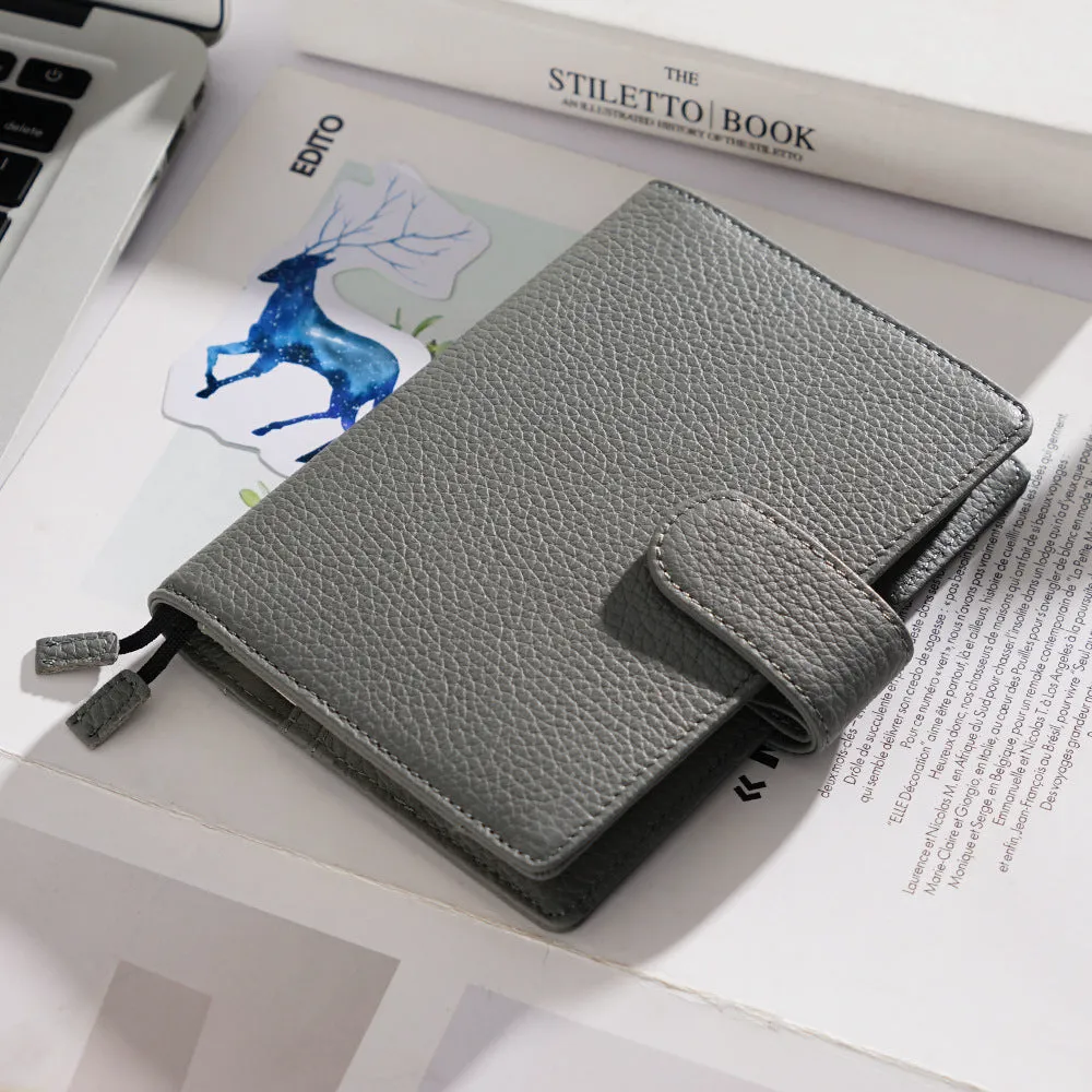 Lychee pattern cowhide leather notebook in A6 size with loose-leaf binding