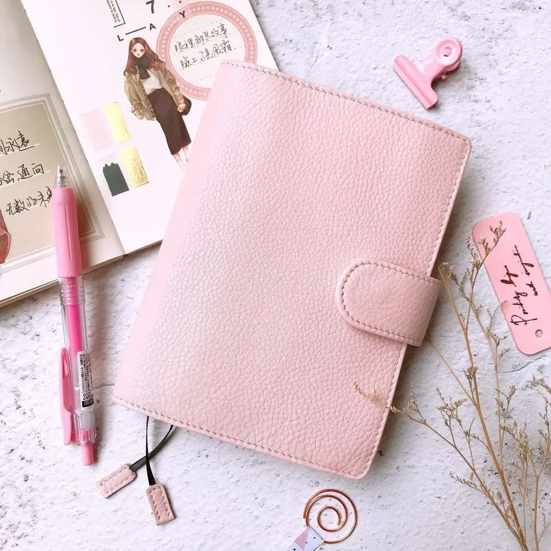 Lychee pattern cowhide leather notebook in A6 size with loose-leaf binding